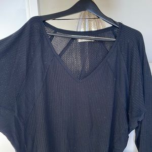 Free People lightly used stretchy black V neck sweater